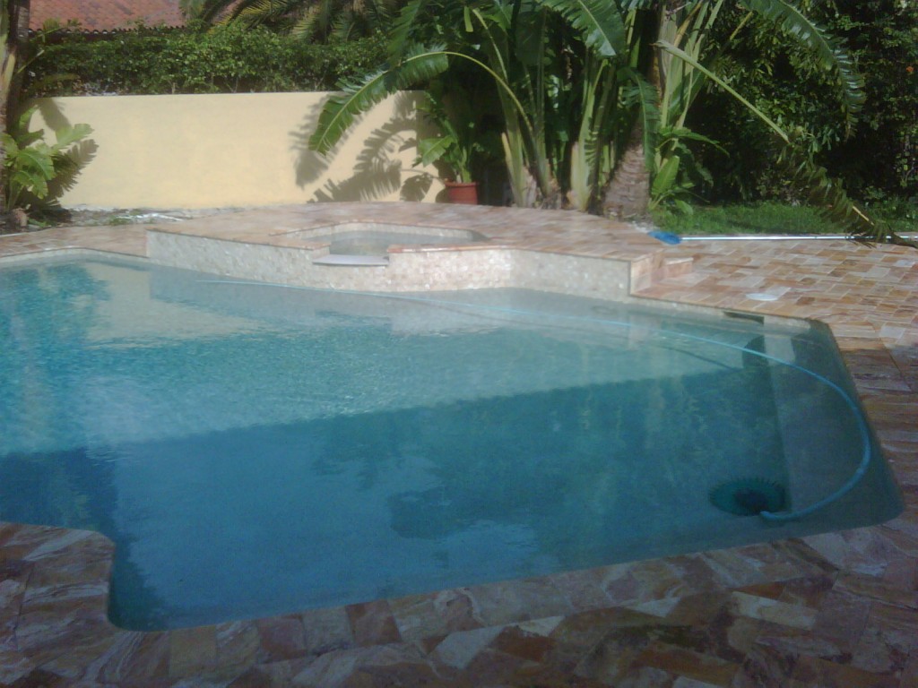 Chiseled Edge Travertine Paver pool deck installed