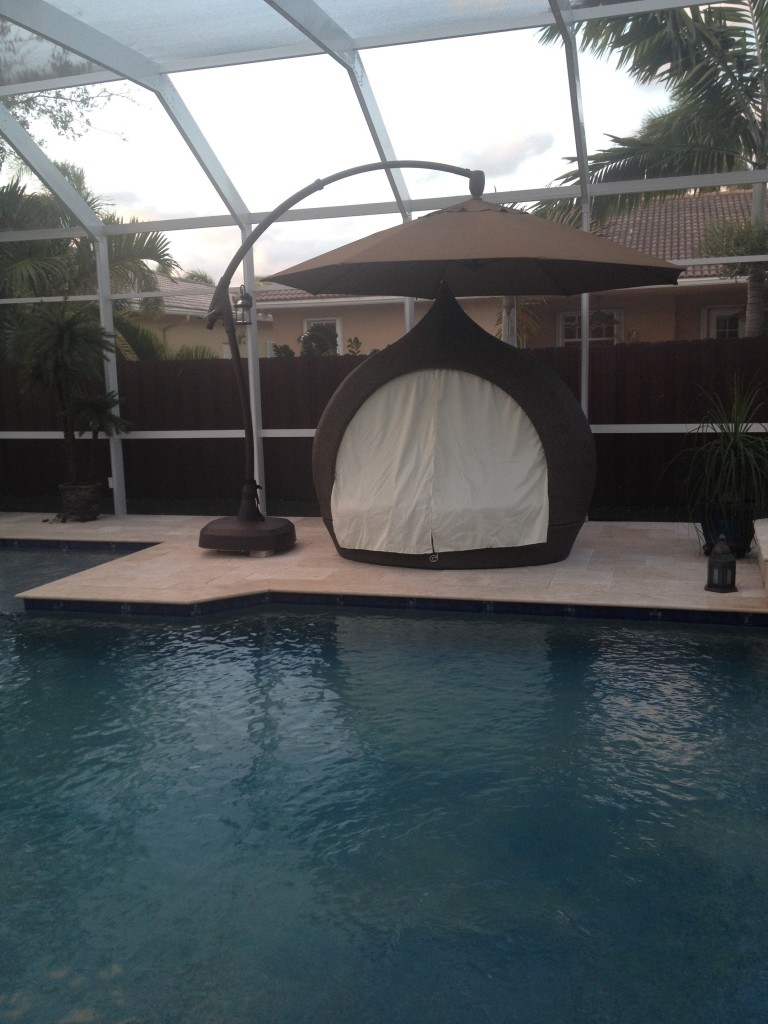 Tumbled travertine pavers around pool