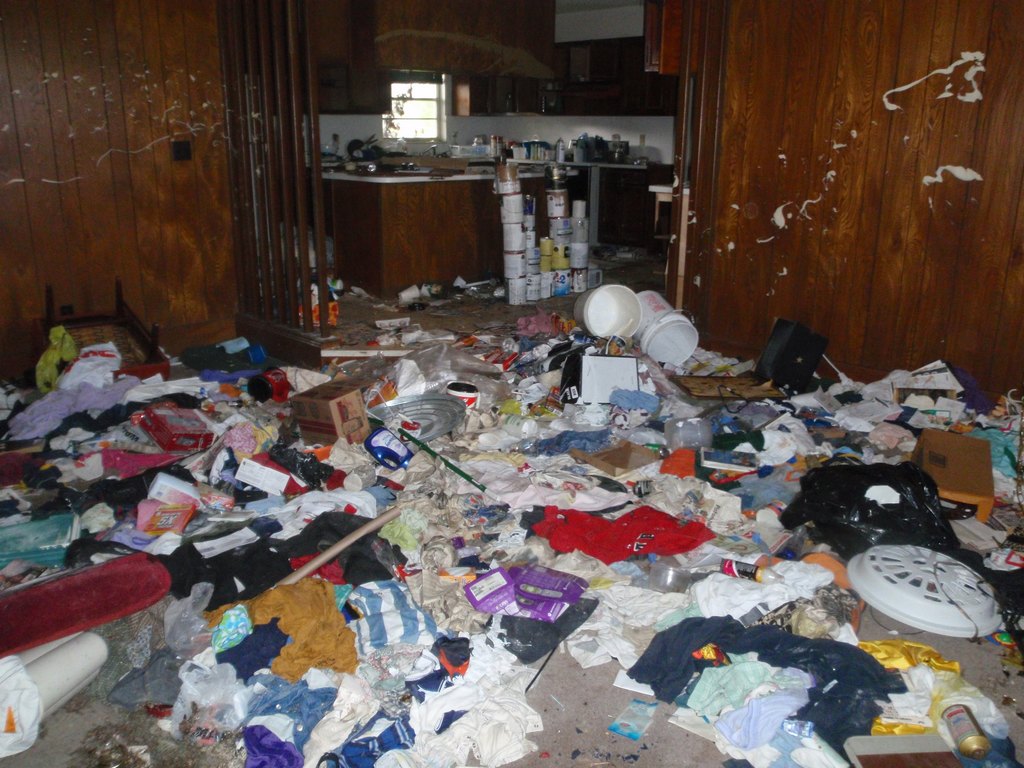 R.E.O. Property family room requiring trash-out