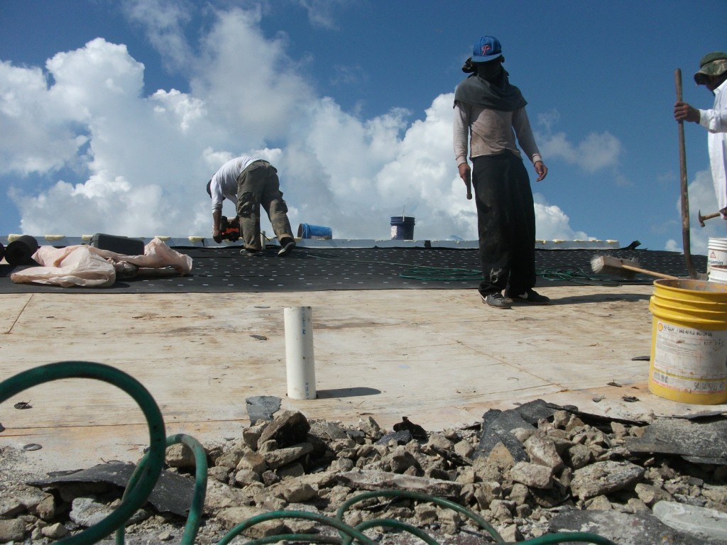 Old roof tiles being removed