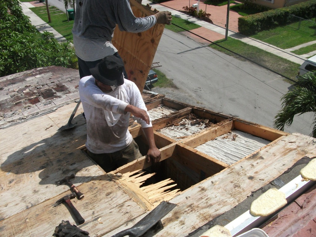 Roof damage being repaired