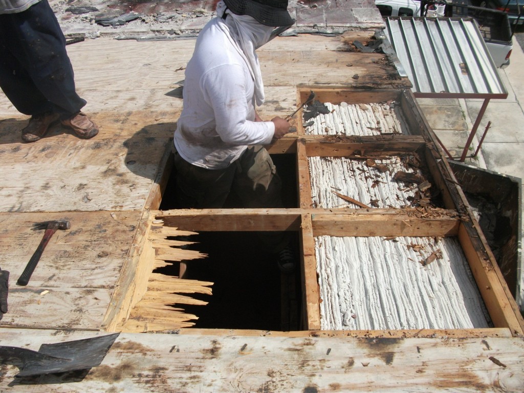 Roof damage being repaired