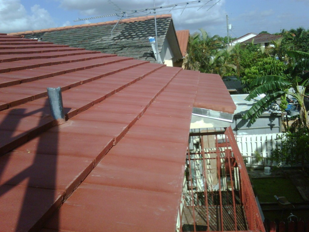 Close-up of new roof tiles on complete roof repair