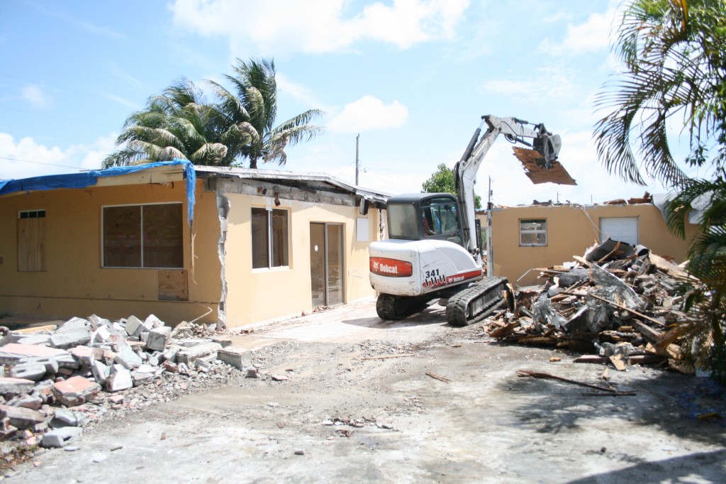Illegal addition partially demolished