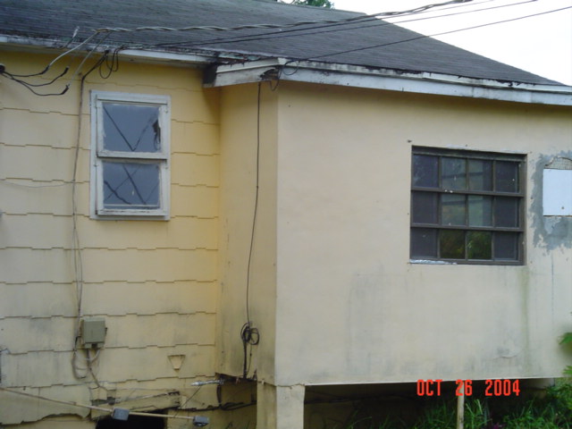 Side of home with violations before rehabilitation