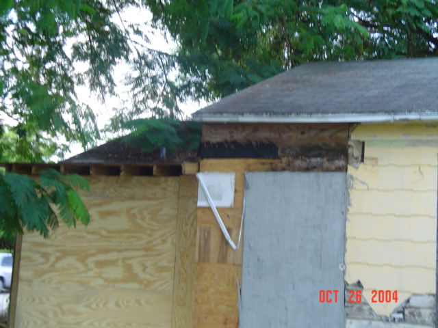 Side of home with violations before rehabilitation