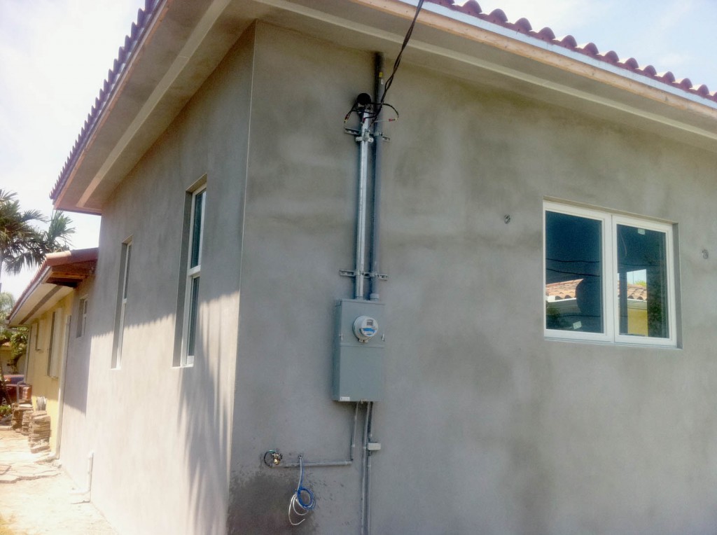 Home addition with plastered exterior walls