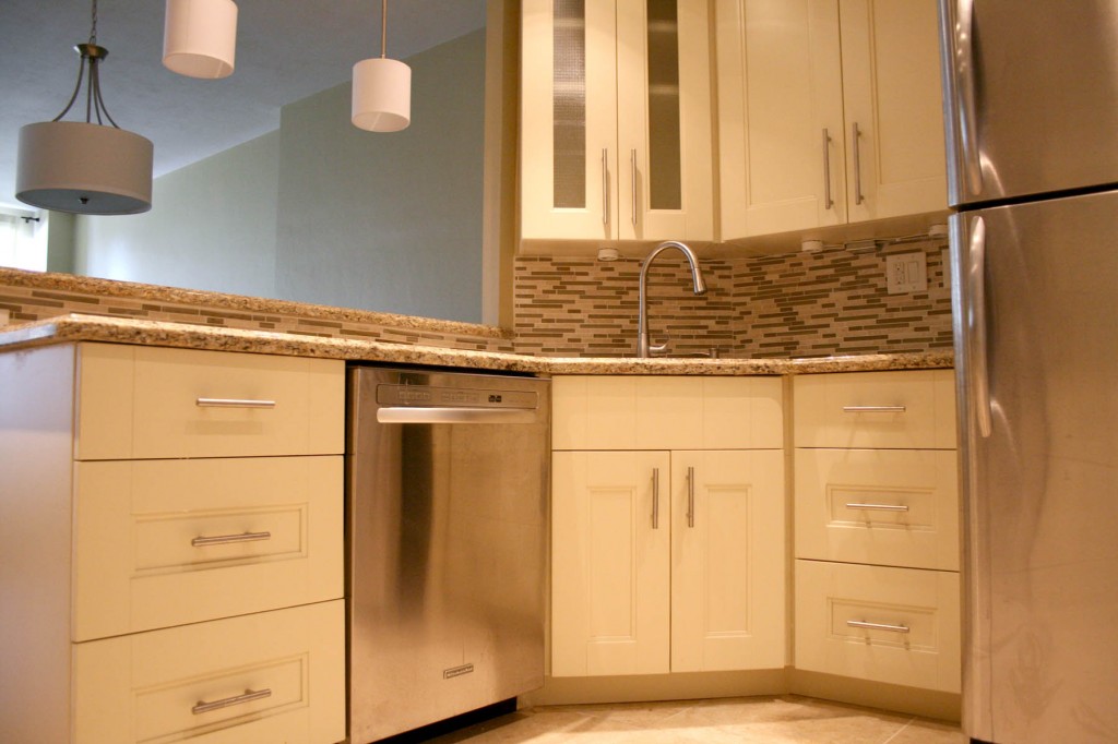 Finalized kitchen with new cabinets, sink and appliances