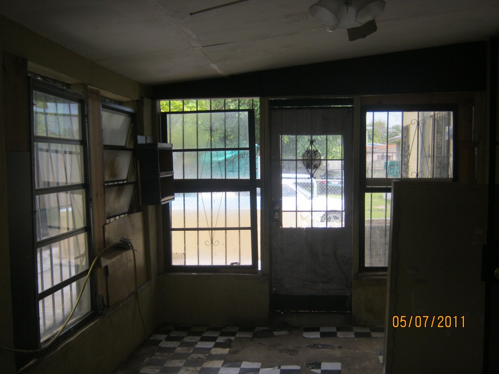 Before photo from inside of illegal addition to be demolished