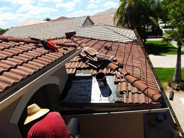 Roof tiles being replaced