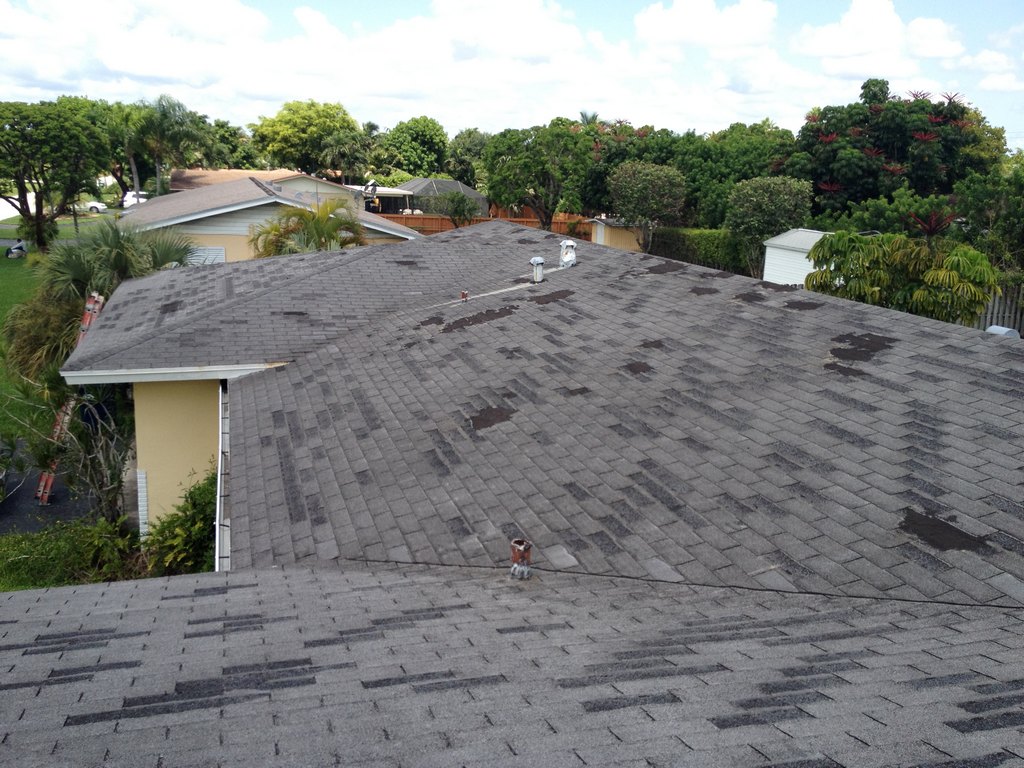 Before photo of roof with old shingles