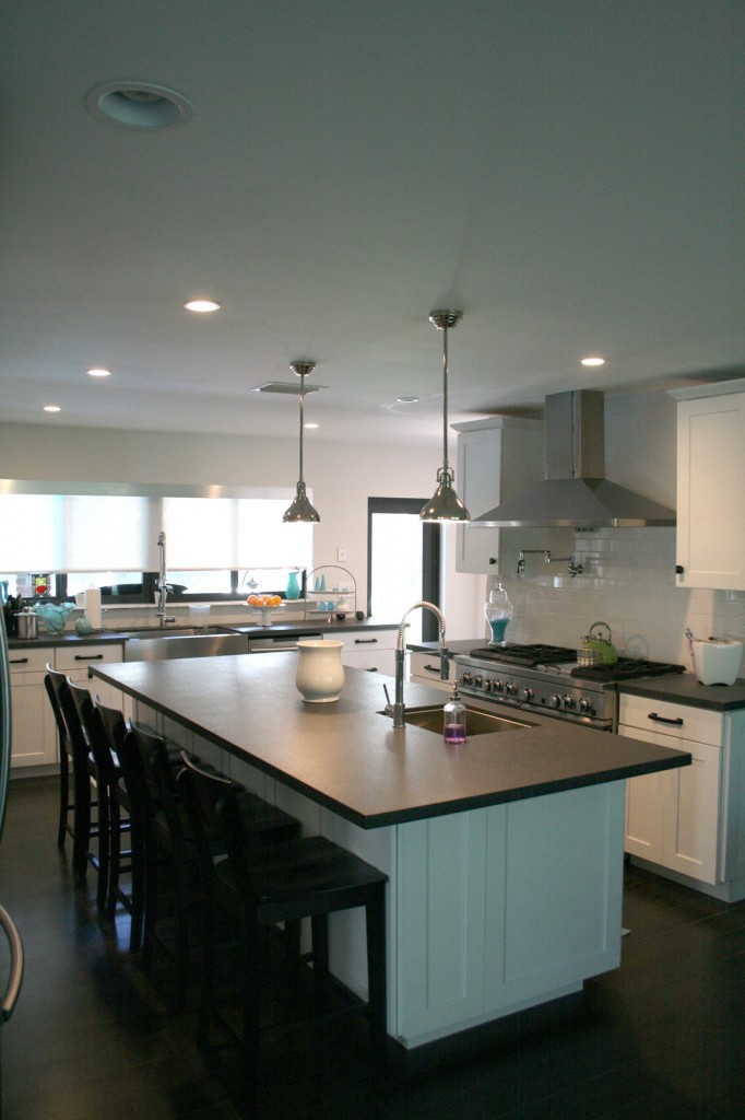 New kitchen with Quartz counter-tops and stainless steel appliances