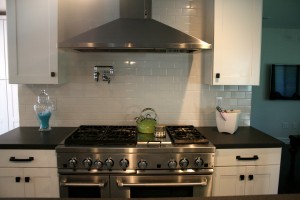 New stainless steel Jenn-Air gas stove and Kitchen Aid hood extractor
