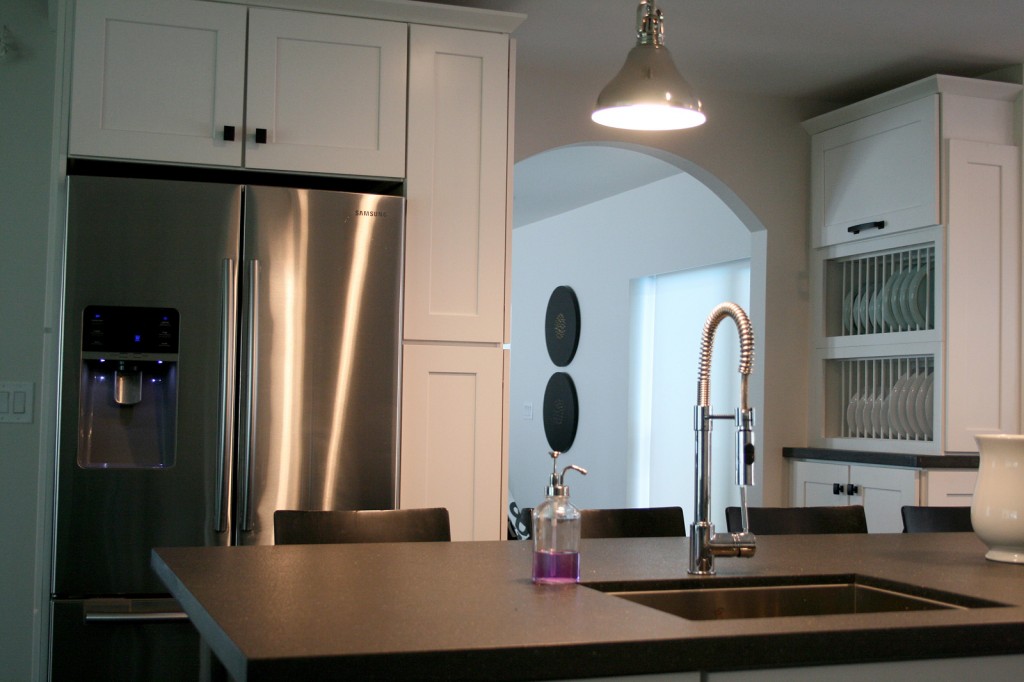 New kitchen with Quartz counter-tops and stainless steel appliances