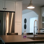 New kitchen with Quartz counter-tops and stainless steel appliances