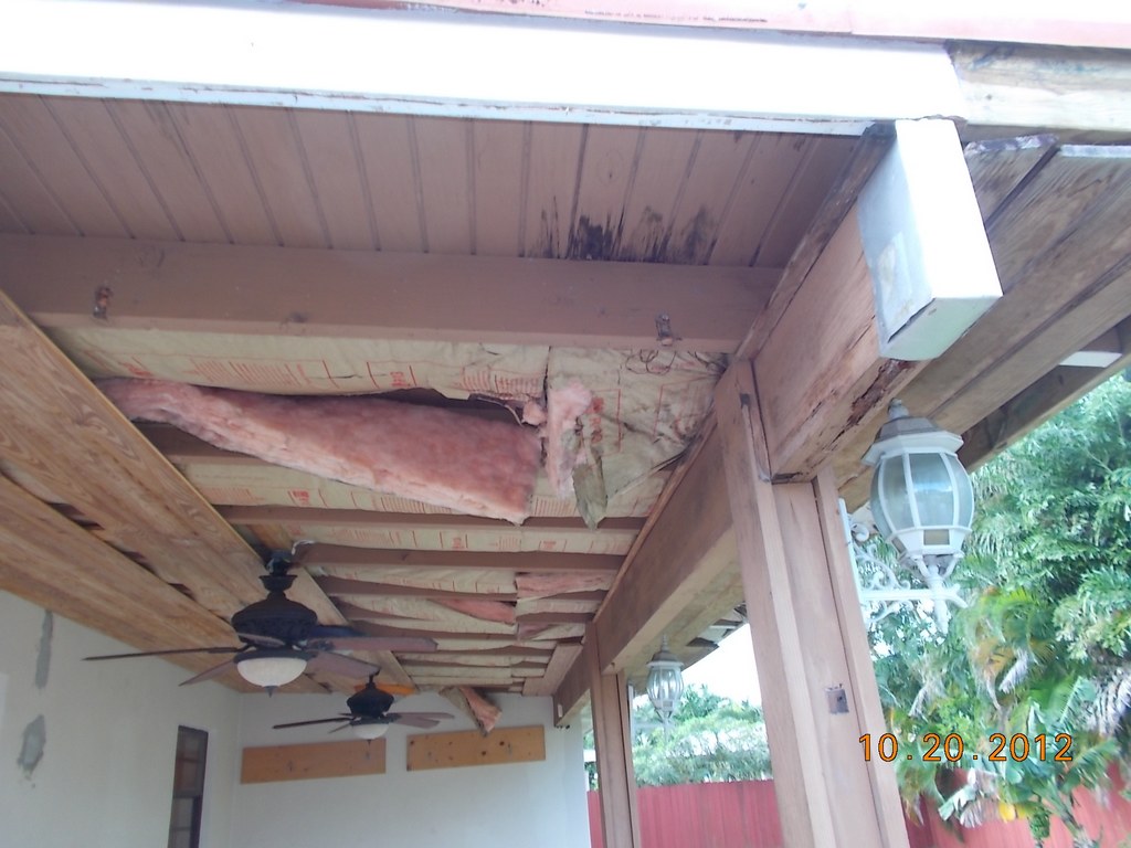 Before photo of damaged patio roof