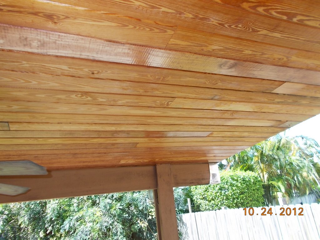 After photo of varnished tongue and groove patio roof
