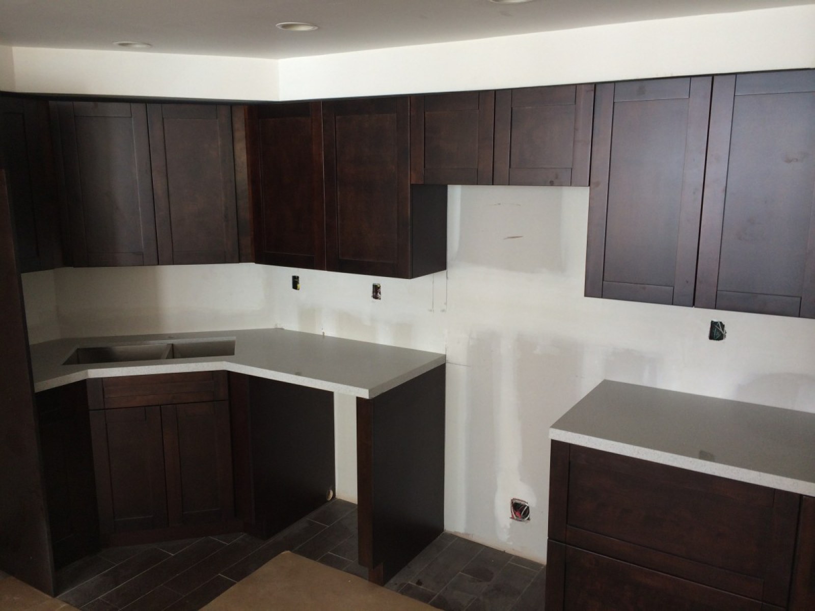 Installation of Shaker Cabinets and Stone Counter Top