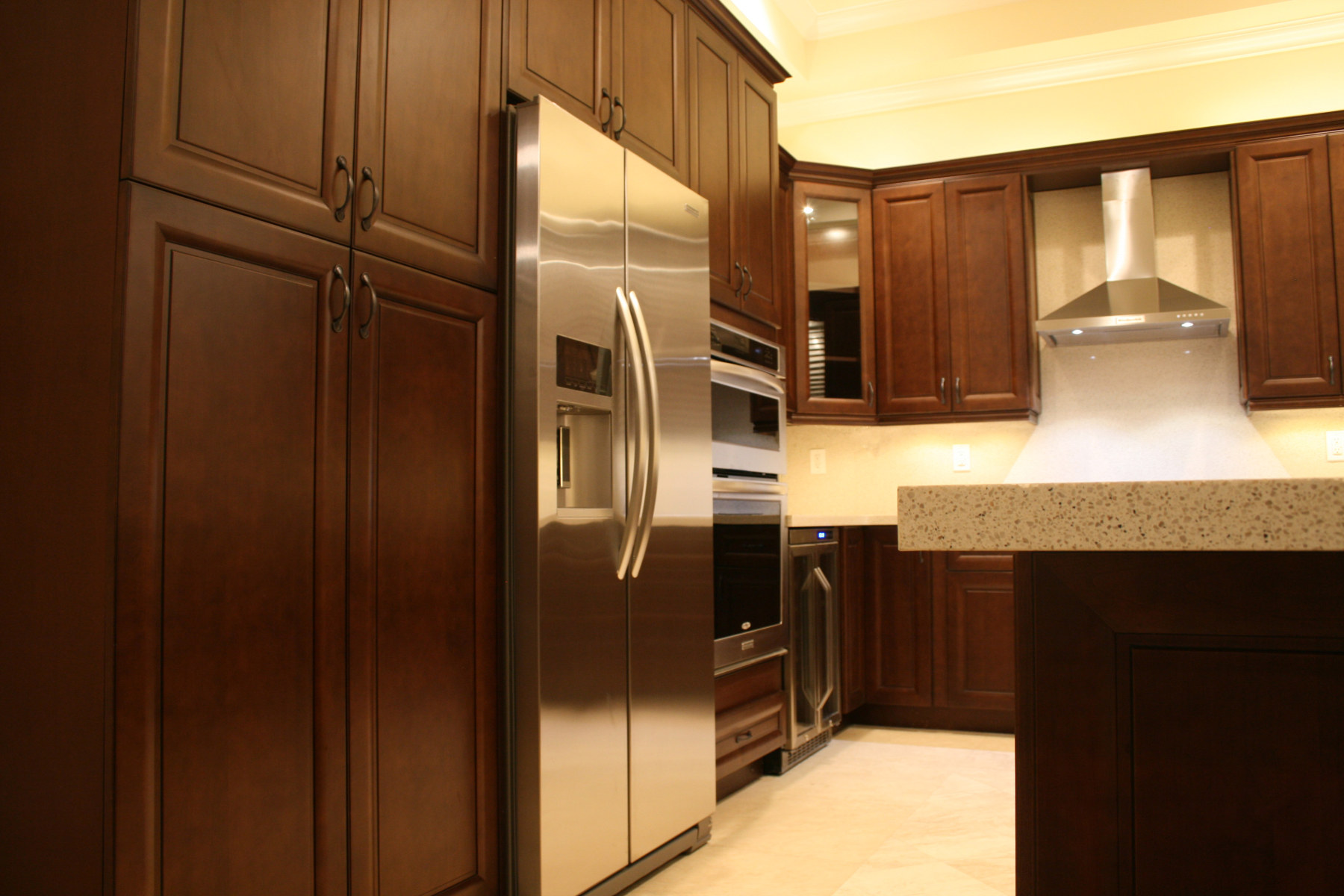 Custom Kitchen with Wood Cabinets and Stainless Steel Appliances