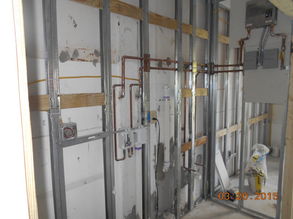 Framing, plumbing & electrical for laundry