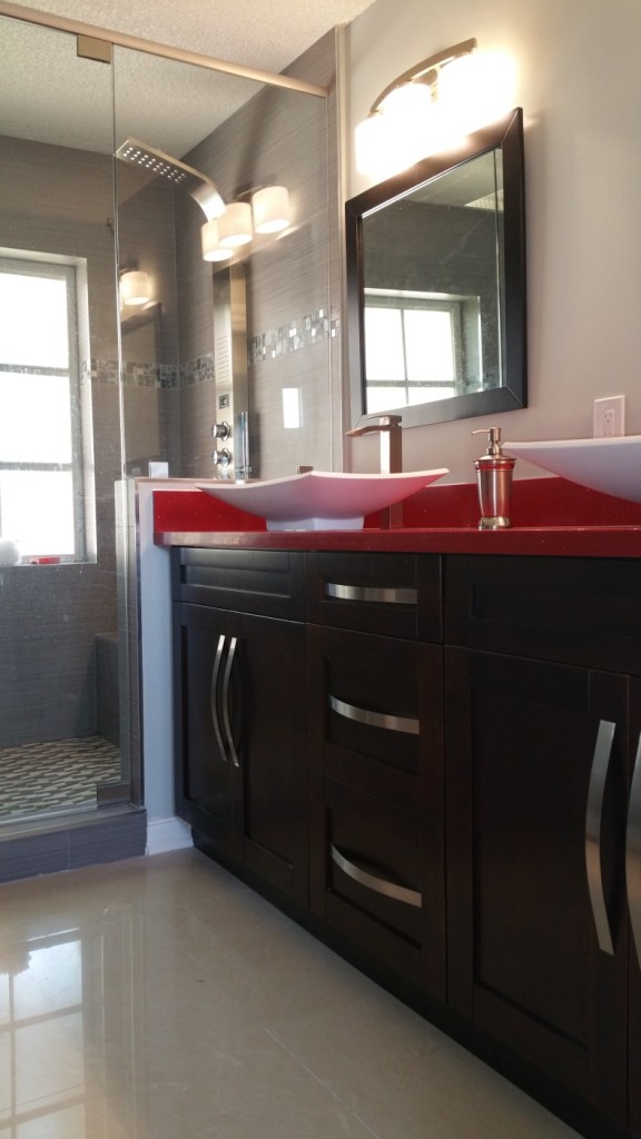 New wood vanity with quartz counter top, vessel sinks & body spray shower