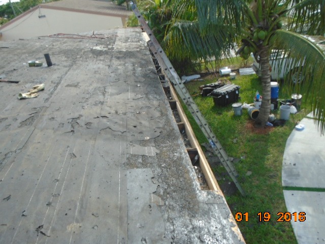 During photo of old shingles being removed