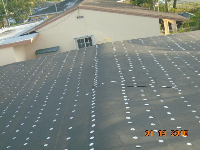 30 Felt Roofing Paper & Tin-Cap installed