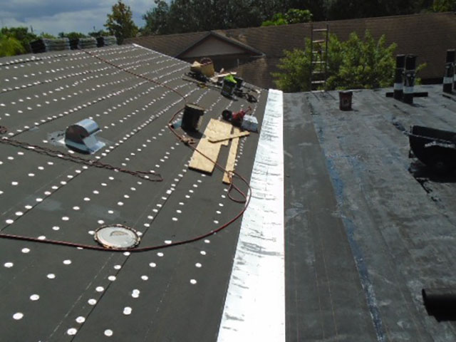New Tin-Cap & Flat Roof installation