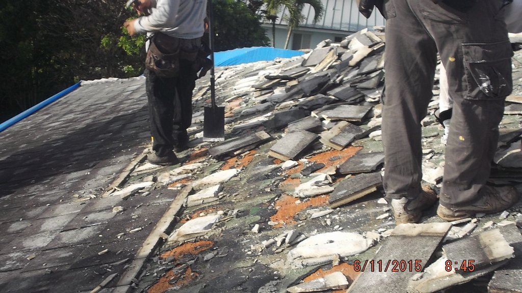 Removal of existing roof tile & tarp