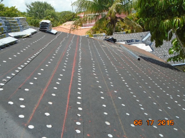 Installed roof paper & tin-cap
