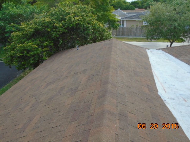 After photo of new flat & shingle roof