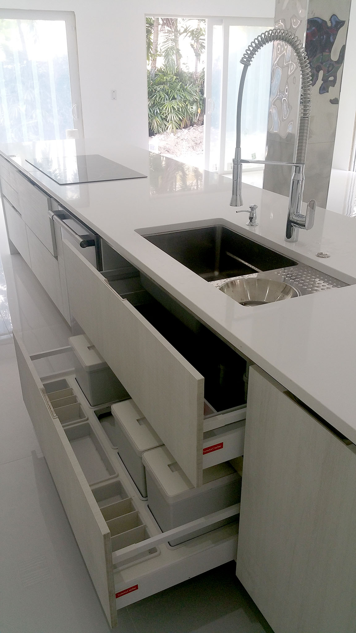 Italian kitchen design with white high-gloss kitchen cabinets