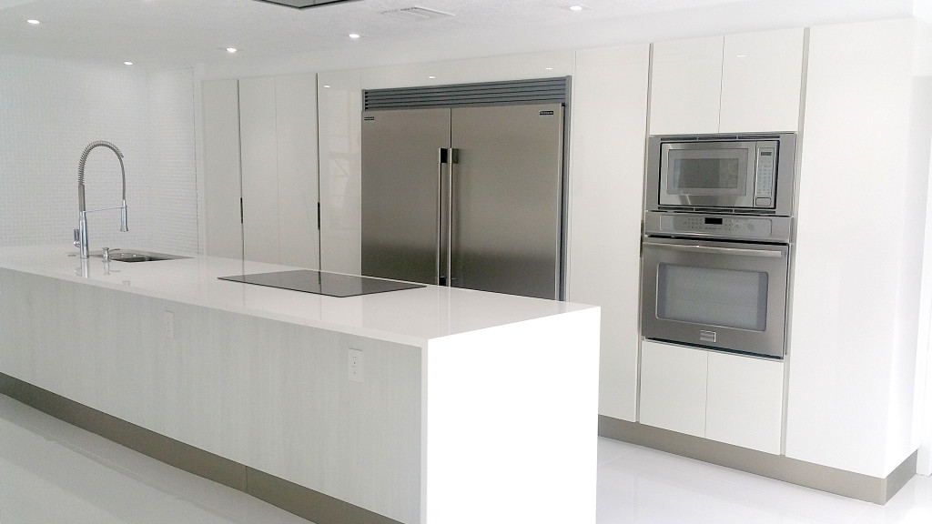 Italian kitchen design with white high-gloss kitchen cabinets