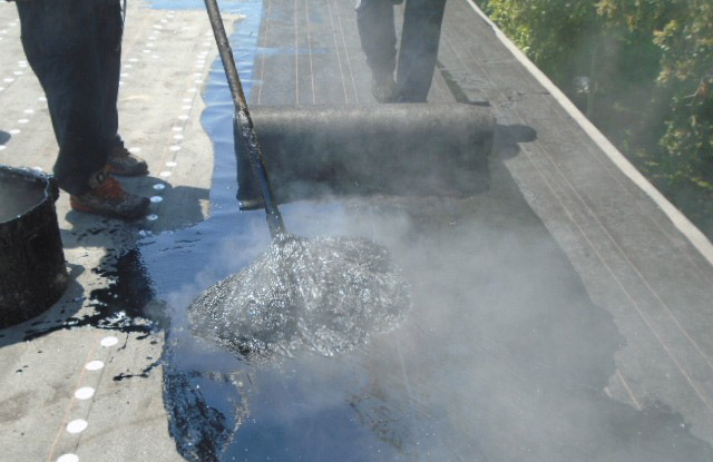 Hot Mop over Flat Roof area