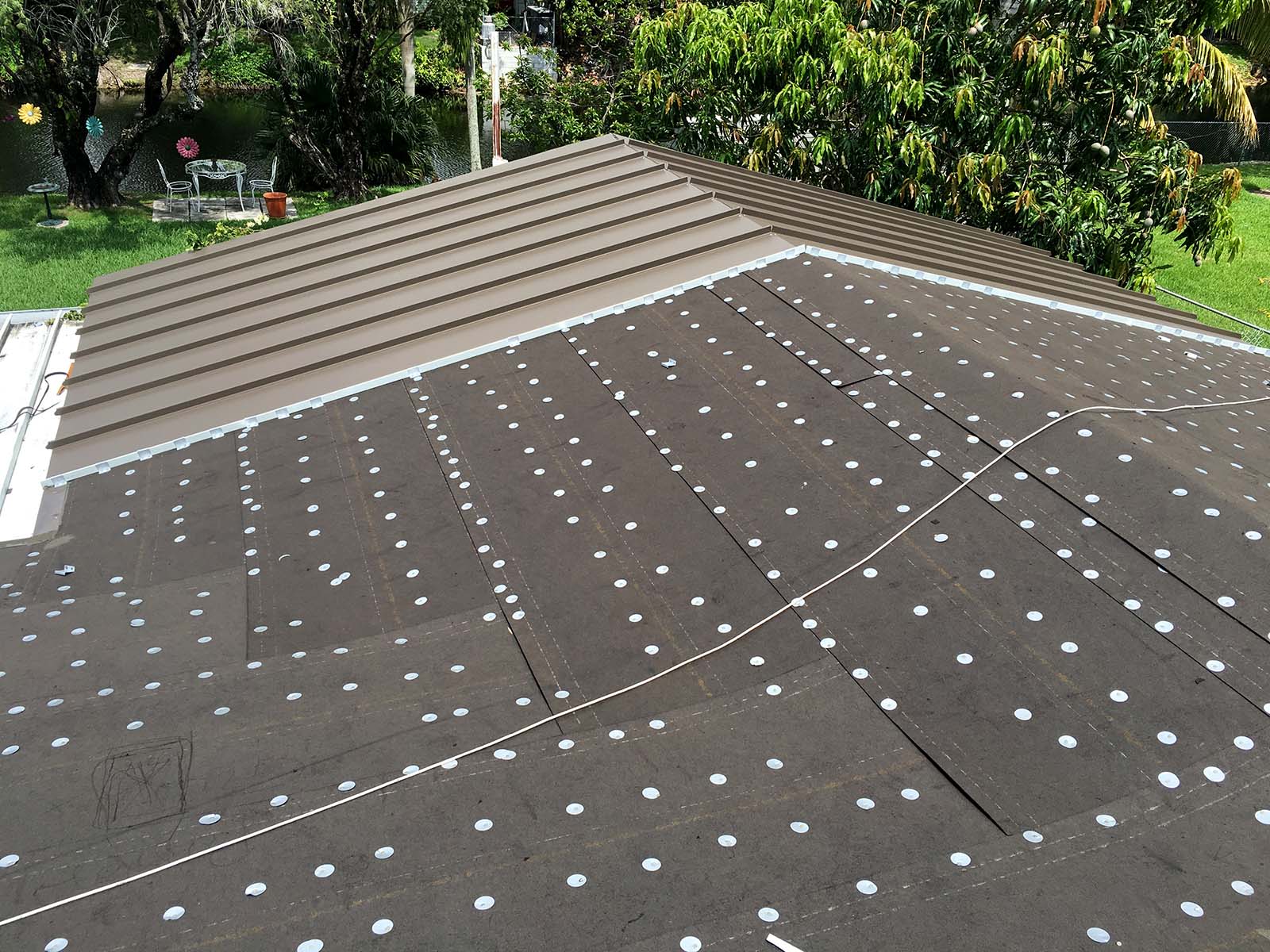 Installation of Galvalume Standing Seam Metal Roof