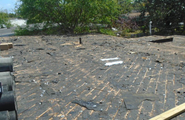 Old flat roof removed exposing decking underneath