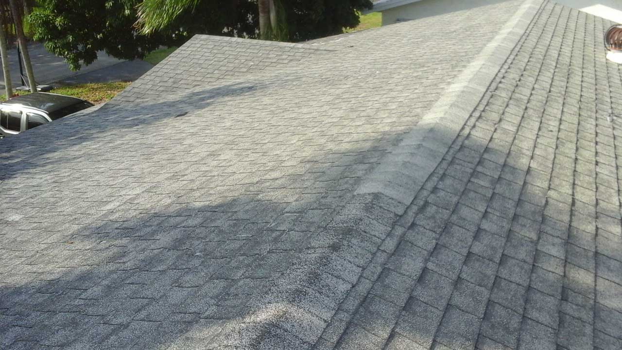Old & weathered shingle roof before removal