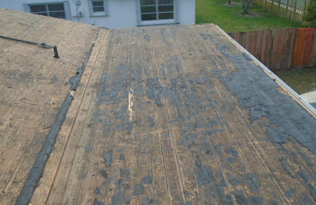 Flat roof decking removal