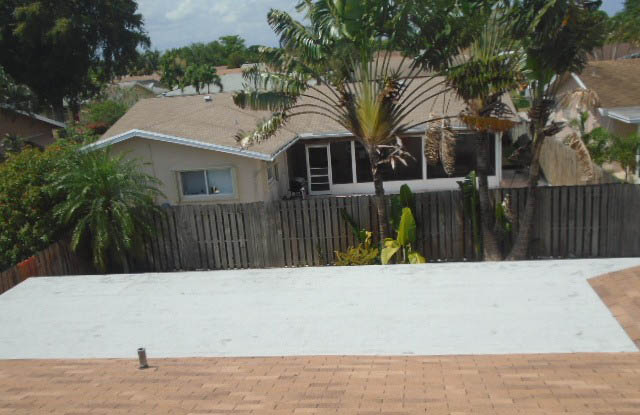New 3-Tab Shingle and Flat Roof installed