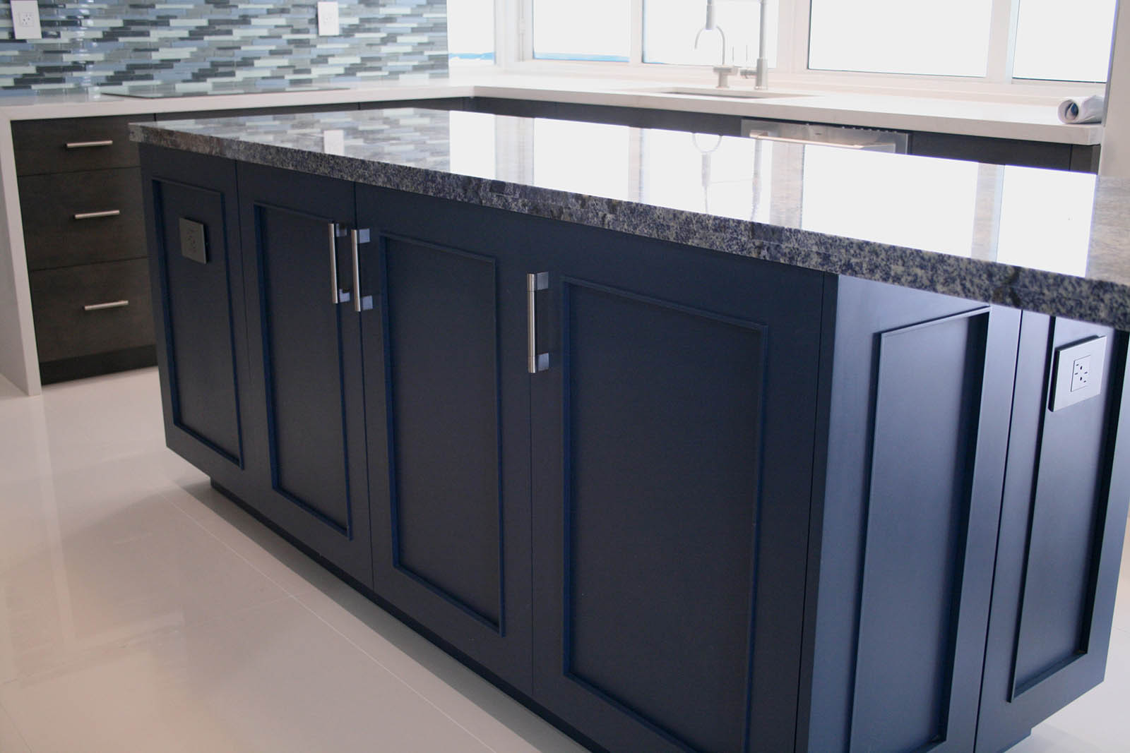 Blue Omega Shaker Cabinets with blue granite counter top