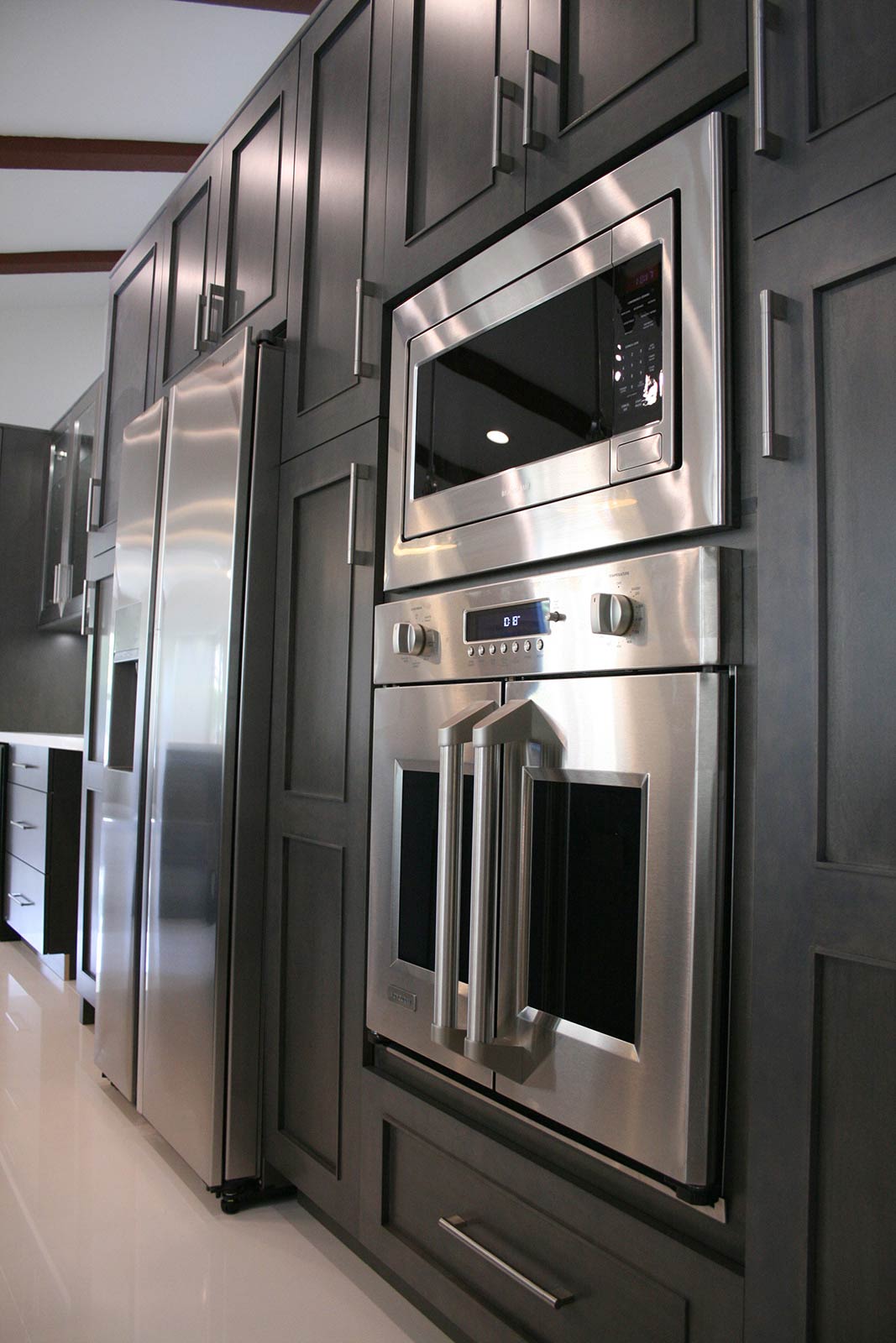 Espresso Cabinets with stainless steel appliances