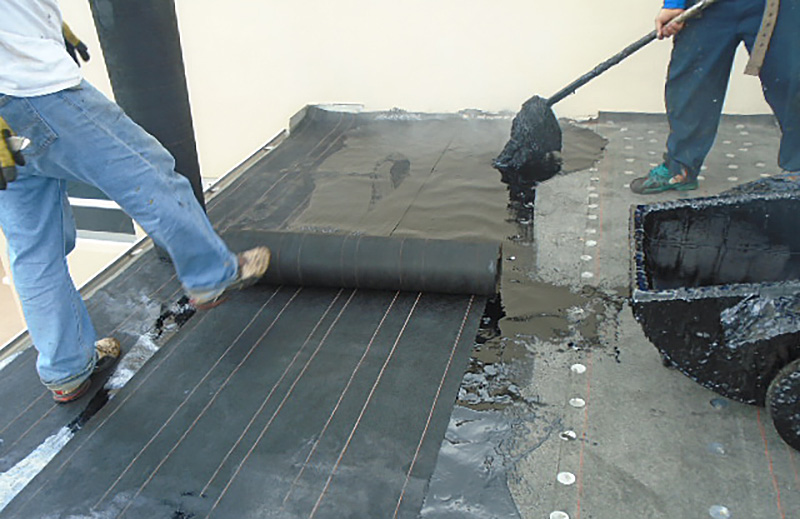Fiber installation on flat roof area prior to Cap Sheet