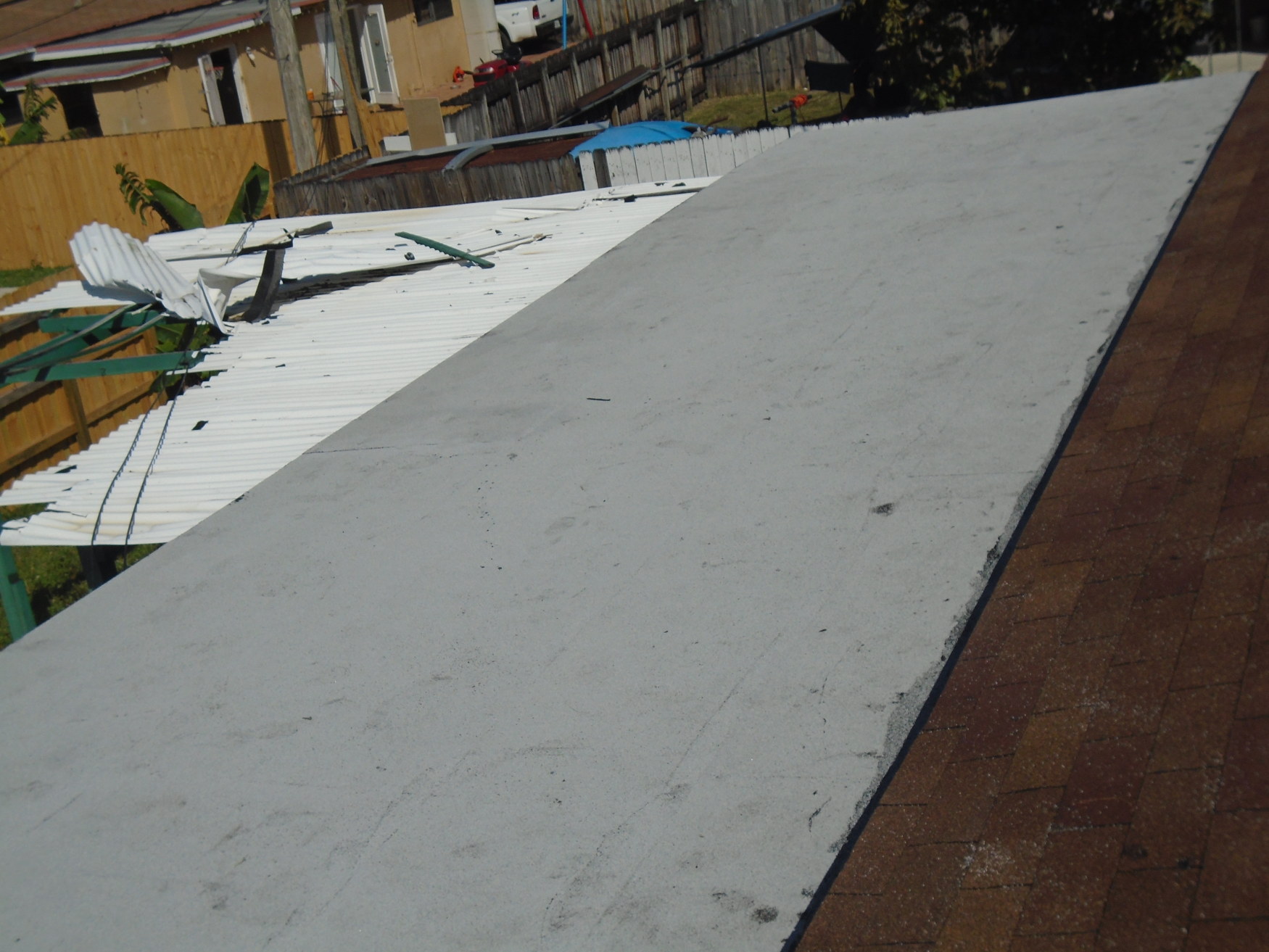 Installed cap sheet over flat roof