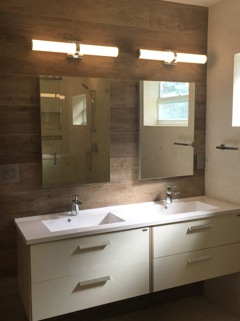 Double floating vanity with quartz countertop & porcelain wall planks