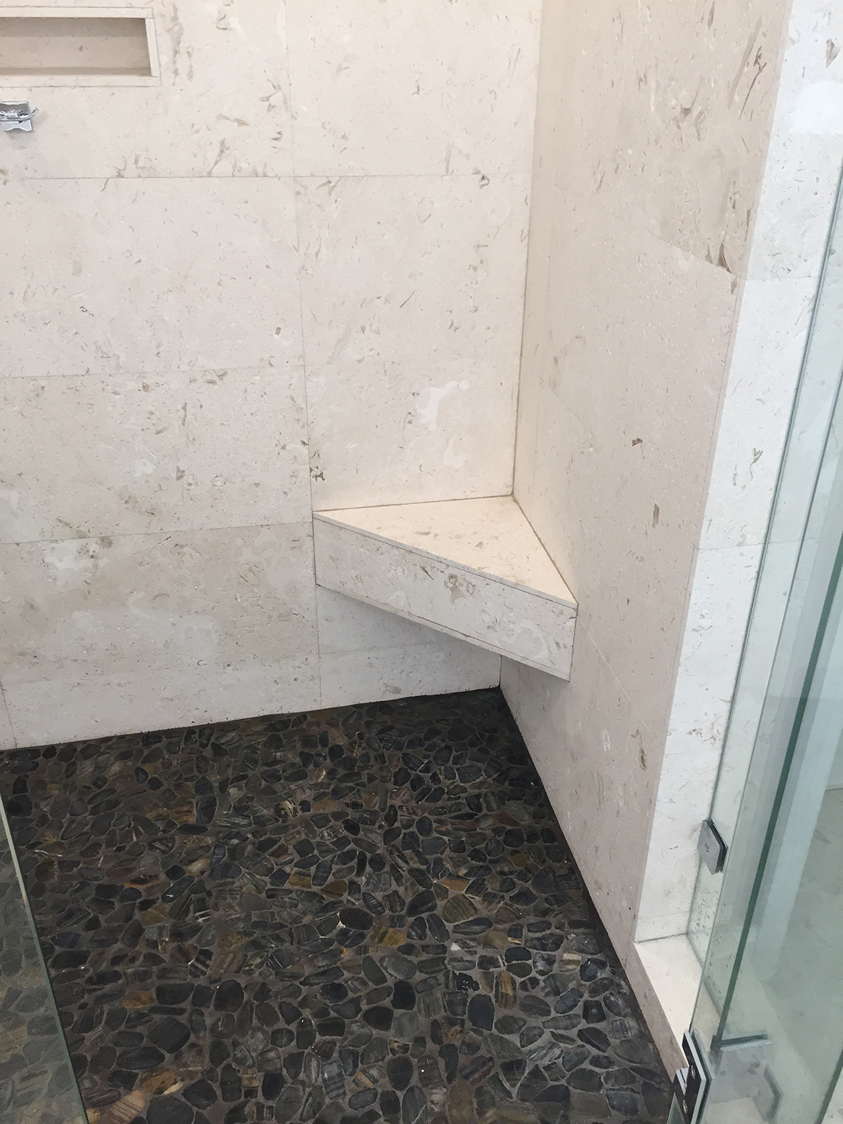 Travertine wall tile in shower
