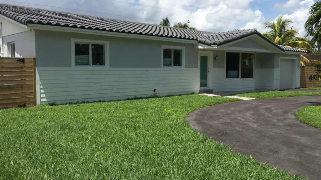 After photo of exterior remodel with stucco siding