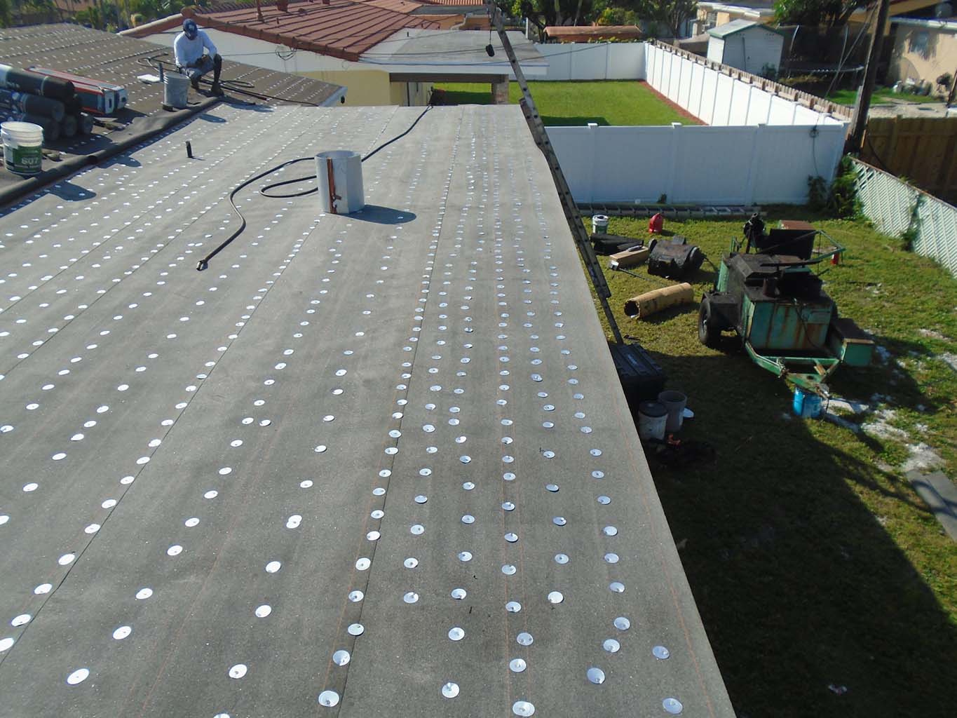 Installation of 75 Felt and Tin-Cap at Flat Roof