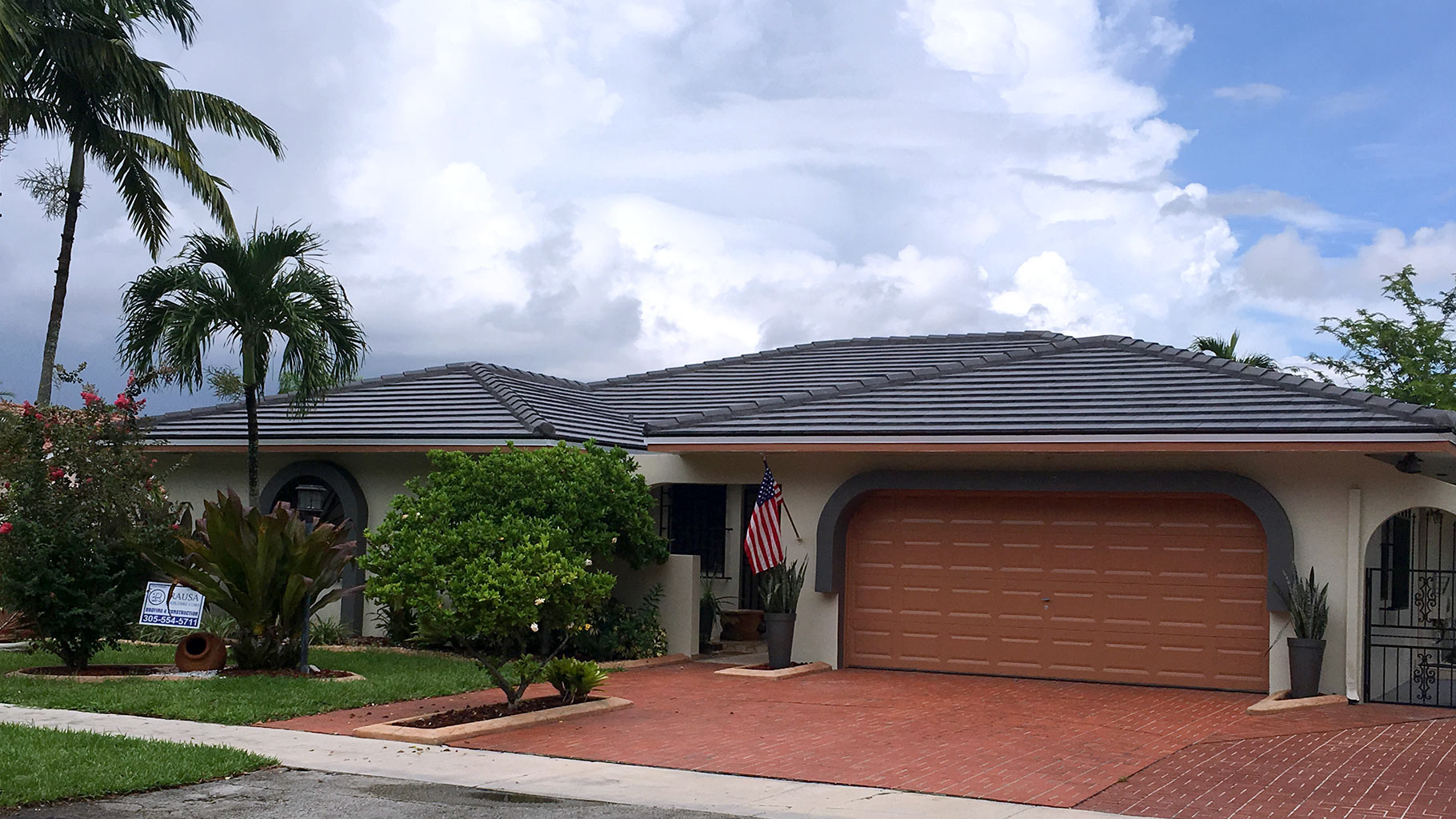 Installed flat concrete roof tile