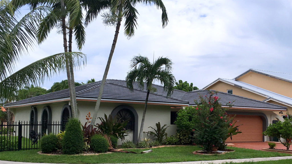 Installed flat concrete roof tile