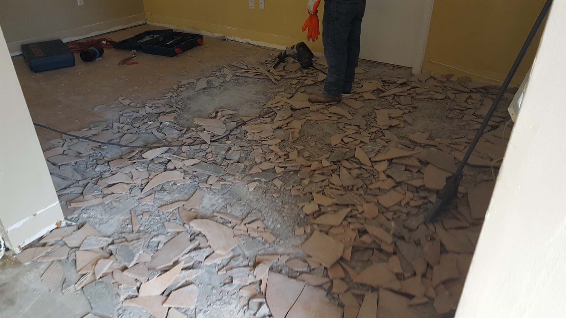 Ceramic tile floor removal prior to porcelain plank installation